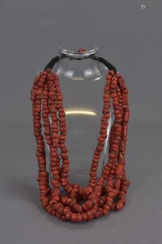 A TIBETAN CORAL BEADED NECKLACE