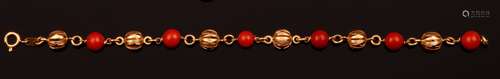 Coral and gold bracelet