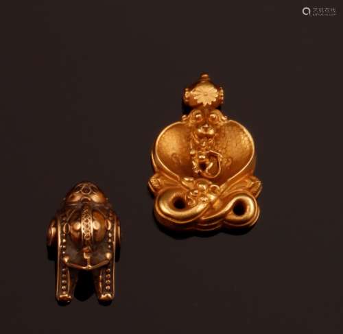 Two gold pendants