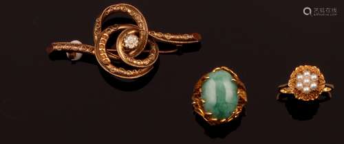 Two gold rings and one brooch