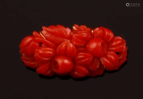 Coral and gold brooch