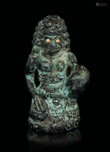 A bronze figure of a deity with gold eyes, Northern India, Pala period (11th-12th century)
