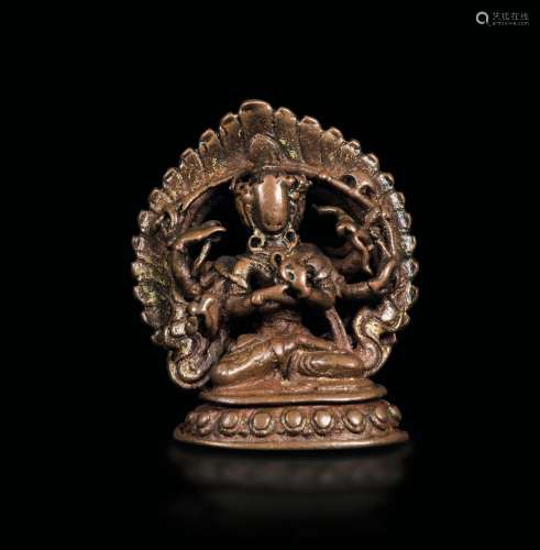 A bronze figure of Amitaya with aura seated on a lotus flower, Nepal, 11th century