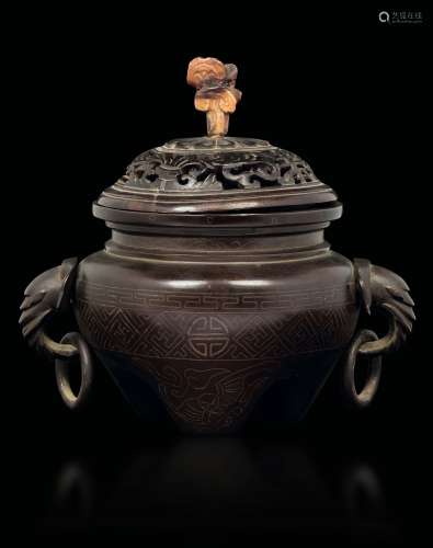 A Shi Shou bronze censer nielloed in silver with elephant head handles and a wooden lid with a horn mushroom-shaped handle, China, 19th century