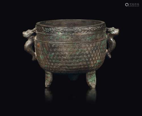 A bronze censer with geometric motifs and dragon head handles, China, Qing Dynasty, Guangxu period (1875-1908)