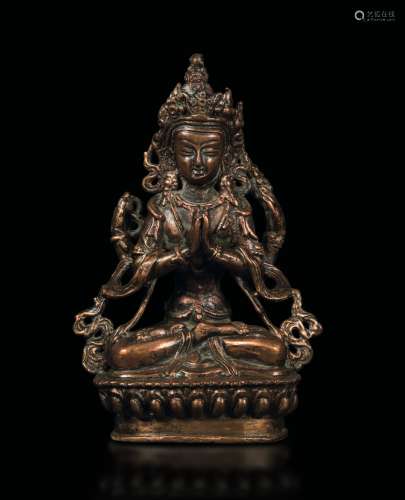 A bronze figure of Avalokitesvara seated on a lotus flower, Tibet/Nepal, 15th century