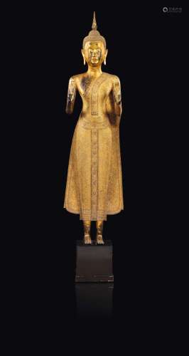 A large gilt bronze figure of a standing Buddha, Thailand, 19th century