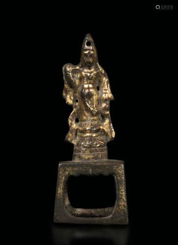 A gilt bronze figure of Lama standing on a lotus flower, Tang Dynasty (618-906)
