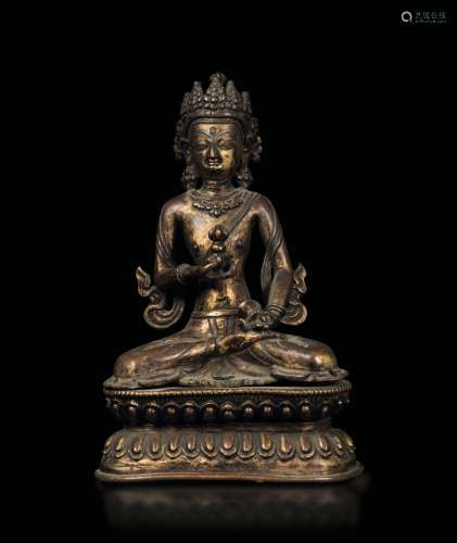 A bronze figure of Avalokitesvara seated on a double lotus flower, Tibet, 14th-15th century