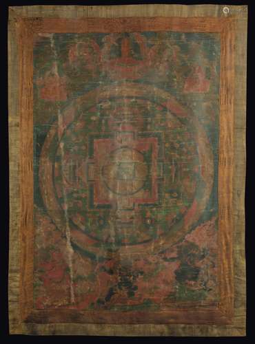 A Tanka on silk with a green backdrop and a central Mandala, Tibet, 18th century