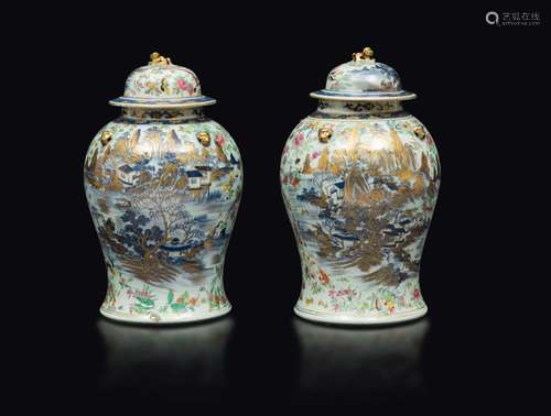 A pair of polychrome glazed porcelain potiches with lids depicting a lacustrine landscape, China, Qing Dynasty, 19th century