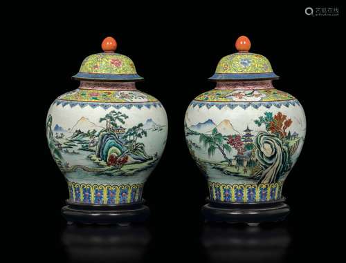 A pair of glazed potiches with lid depicting landscapes, China, Canton, Qing Dynasty, late 19th century