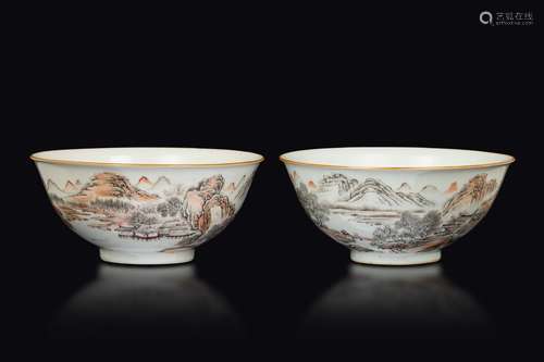 A pair of porcelain bowls with a depiction of mountain and lake landscapes, China, Qing Dynasty, Qianlong period (1736-1796)