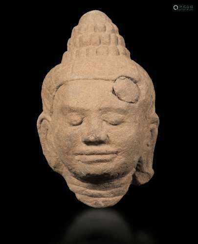 A stone Buddha head, Khmer, 13th century