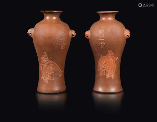 A pair of monochrome grès vases with figures of travellers and inscriptions, China, Yixing production, 19th century