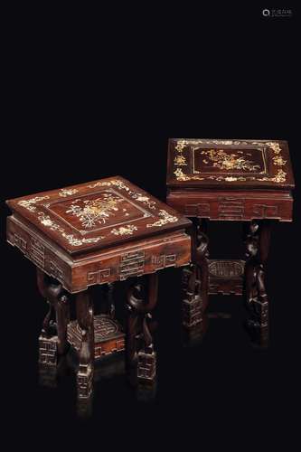 A pair of homu wooden tables with mother-of-pearl inserts and naturalistic depictions, China, Qing Dynasty, 19th century