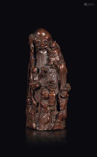 A bamboo wood Shoulao figure with children, China, Qing Dynasty, 19th century