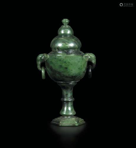 A spinach jade vase with lid, with elephant heads and ring handles, China, Qing Dynasty, 19th century
