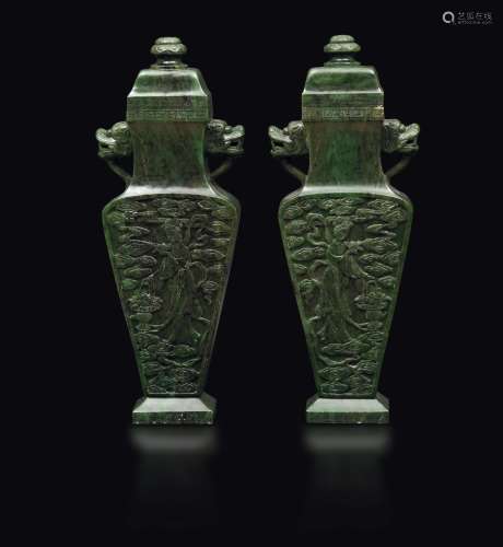 A pair of vases with lids in spinach jade depicting Guanyin, China, late 19th century
