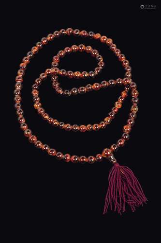 Ornamental prayer beads with amber spheres, China, Qing Dynasty, 19th century