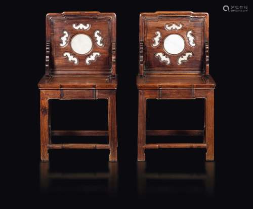 A pair of homu wooden chairs with marble inserts along the backrests, China, Qing Dynasty, 19th century