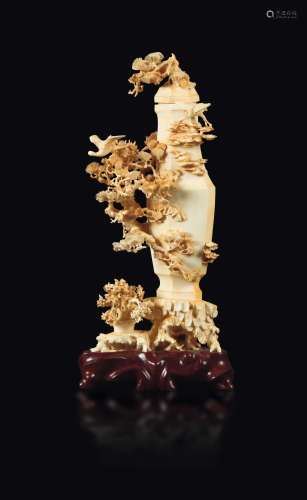 A carved ivory vase and lid with a decor of birds on branches, China, Qing Dynasty, 19th century
