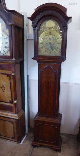 A Regency Scottish Long Case Clock, with brass dial inscribed 'Allan Faulds Kilmarnock', Roman numerals and two secondary dials, cast gilt spandrels; Corinthian columns to both sides of face, carved double pediment and supported on bracket feet, approx 217 x 52 x 24 cms.