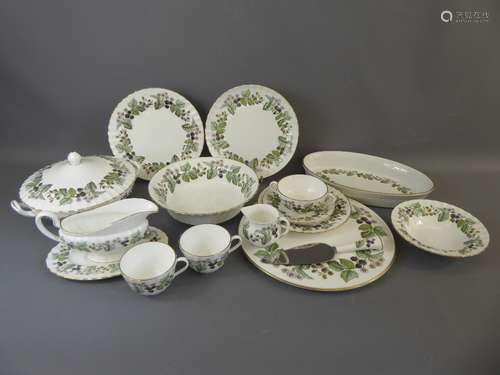 A Comprehensive Royal Worcester Dinner Service Pattern Number Z2821, comprising, deep round meat plate approx 32 cms dia, twelve dinner plates, twelve fish plates, twelve dessert plates, two lidded vegetable dishes, gravy boat and saucer, fruit bowl, oval serving dish, round cake platter, cake knife, twelve cake plates, twelve side plates, milk jug, creamer, sugar bowl, twelve dessert bowls, twelve soup bowls with handles, twelve soup saucers, twelve tea cups and twelve tea saucers. (approx 120 pieces),