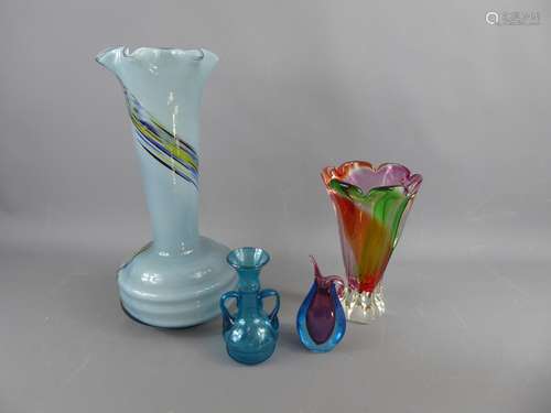 A Collection of Art Glass, including a Josef Hospodka multi-coloured fluted shape vase approx 24 cms high, a sommerso blue flower jug with pink bubble inclusion, approx 15 cms high, a large light blue vase with streaked decoration, approx 39 cm high and a deep blue double handle vase with inclusions, approx 15 cms high. (4)