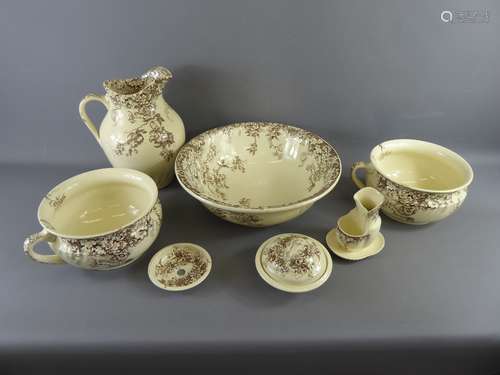 A Staffordshire Ironstone Wash Set, comprising basin and pitcher, shaving brush holder, soap dish, pot bowl and cotton wool jar and cover, pattern nr 921.