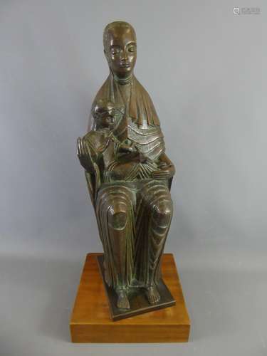 A Composite Bronze-Style Madonna and Child Figurine, the draped figure bearing the child in her lap and a Dove, approx 63 cms on wooden plinth.