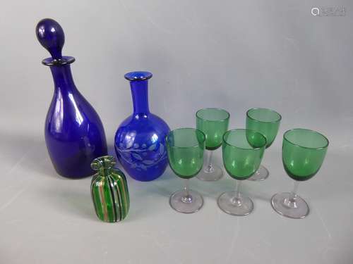 An Antique Bristol Blue Glass Decanter and Stopper, together with a blue glass water decanter and five Victorian green glass sherry glasses and a Nailsea glass vase, approx 11 cms. (8)