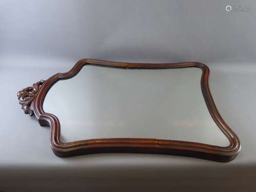 A Victorian Serpentine Mahogany Framed Hall Mirror, approx 50 x 82 cms (af)