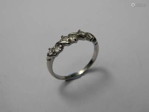 A 9 ct White Gold and Diamond Ring, the ring set with approx .30 pts of dias., size M, approx wt 1.6 gms.