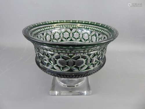 A Victorian Bohemian Cut (to clear) Emerald Glass Fruit Bowl, a circular faceted design, raised on square cut pedestal base, approx 22 x 25 cms diameter.