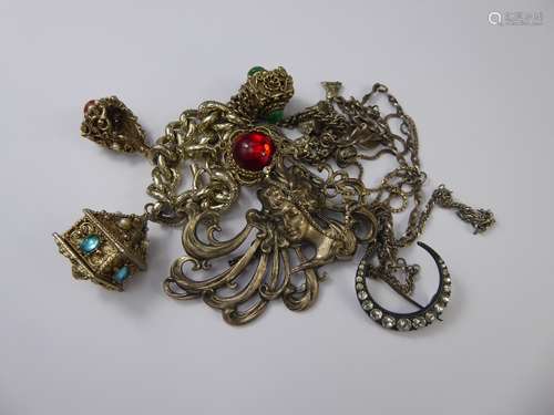 Miscellaneous Silver and Costume Jewellery, including a Art Nouveau brooch depicting a lady, approx 85 x 60 mm, a white metal charm bracelet, two silver chains and bracelet, together with a crescent brooch.