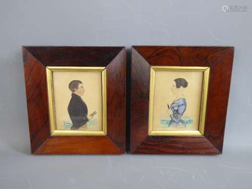 A Pair of Georgian Profile Portrait Miniatures,depicting a gentleman and lady, unsigned, presented in rosewood frames, approx 8 x 10 cms each. (2)