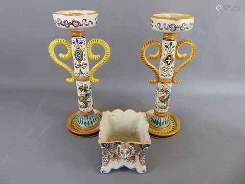 A Pair of Italian Majolica Candlesticks, approx 31 cms nr 595 together with an antique Italian majolica planter decorated with coat of arms (af).