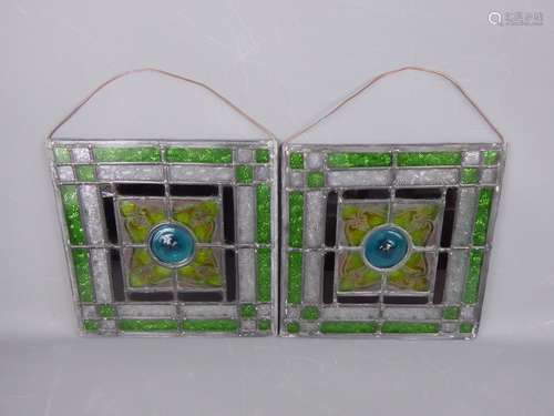 A Pair of Lead-Coloured Glass Windows, with copper wire for suspension, approx 28 x 29 cms.