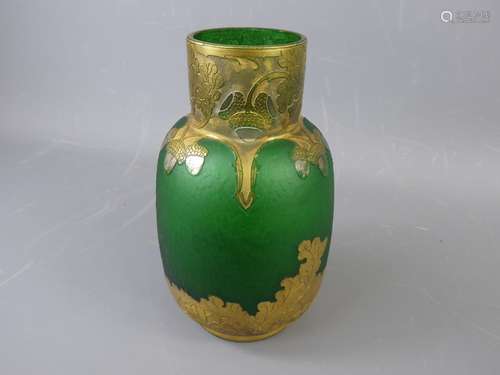 An Art Nouveau St Denis Legras & Cie Glass Vase, emerald green glass with gilded and silvered overlay in relief depicting oak leaf and acorns to the upper and lower sections, approx 20 cms, signed to base.