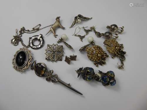 Collection of Vintage Jewellery, including five pairs of earrings (Indian floral earrings, hoop earrings and stud earrings) and brooches including a Labrador brooch, niello-style disc pendant, smoky Quartz Celtic kilt pin, approx 90 gms.