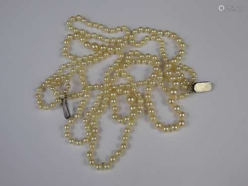 A Vintage Three-Strand Graduated Cultured Pearl Necklace, approx 46 cms, on silver clasp, pearls range from 4mm to 7mm.