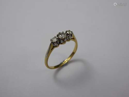 A 18ct Yellow Gold Three Stone Diamond Ring, the ring set with approx 30 to 35 pts of old cut dias, size M, approx 2.2 gms.