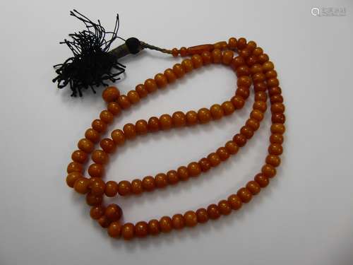 Butterscotch Amber-Style Beaded Necklace, on a silk tassel, approx 31.3 gms, approx 66 cms.