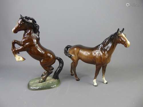 A Pair of Vintage Beswick Horses, a rearing bay Welsh Cob (first version, model no.1014), approx 27 cms, the other, a standing bay racehorse, approx 22 cms.