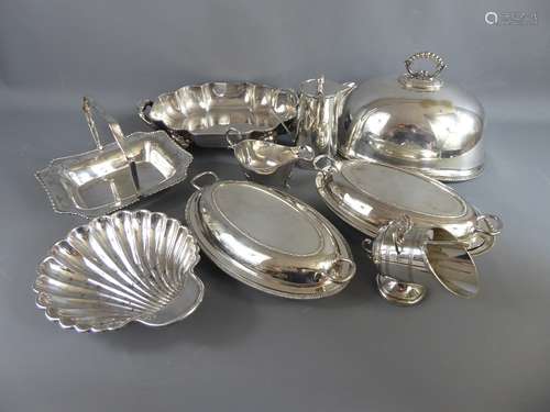 A Pair of Silver Plated Serving Dishes and Covers, together with a Walker & Hall sauce boat, a vintage sugar scuttle and scoop, a coffee pot, a Ducal bon-bon with handle on bun feet, a scalloped entree dish approx 29.5 x 22 cms (cover missing),a meat dome approx 32 x 25 cms and a scalloped shell shaped footed serving bowl approx 24 x 20 cms.