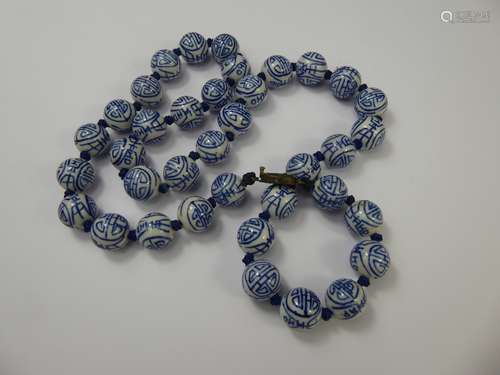 A Chinese Blue and White Porcelain Beaded Necklace, approx 65 cms.