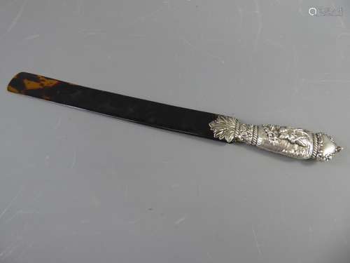 A Tortoiseshell and Silver Page Turner, London hallmark, dated 1890/91, mm WP? (rubbed), approx 40 cms.