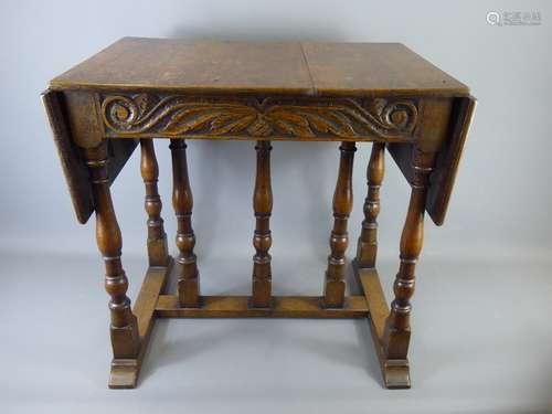 An Antique Rectangular Oak Drop-Leaf Side Table, with turned baluster legs united by a three leg support H stretcher, approx 104 x 41 x 60 cms.