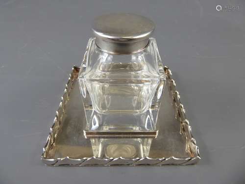 A Silver and Cut Glass Inkwell, stamped 925, the cut glass inkwell seated in a square silver well, stamped 925, mm DP.